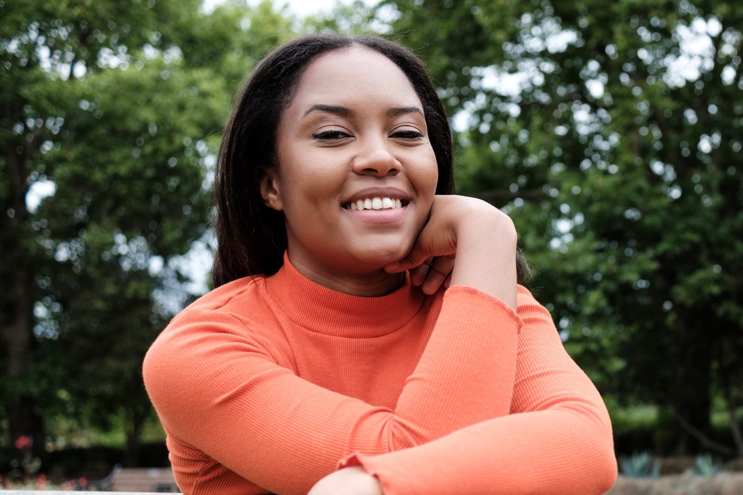 Woman smiling on park bench