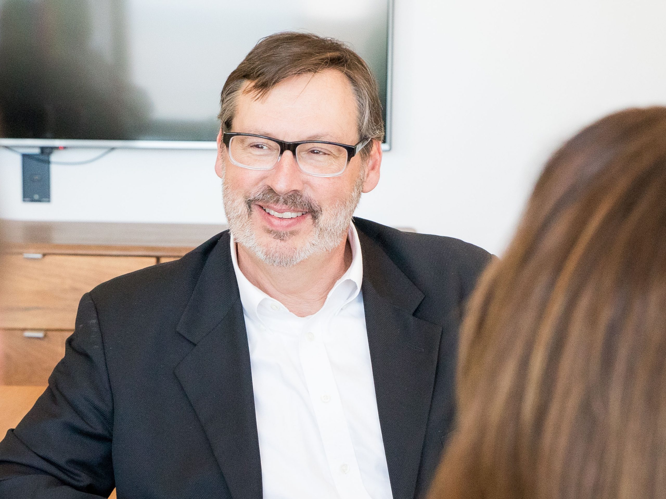Man sitting at table in office