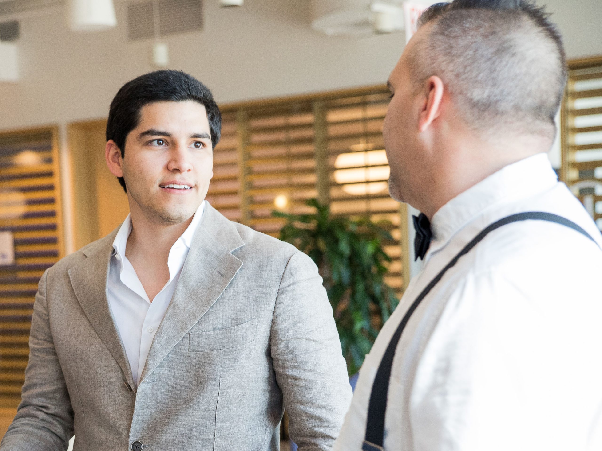 Two people talking in office