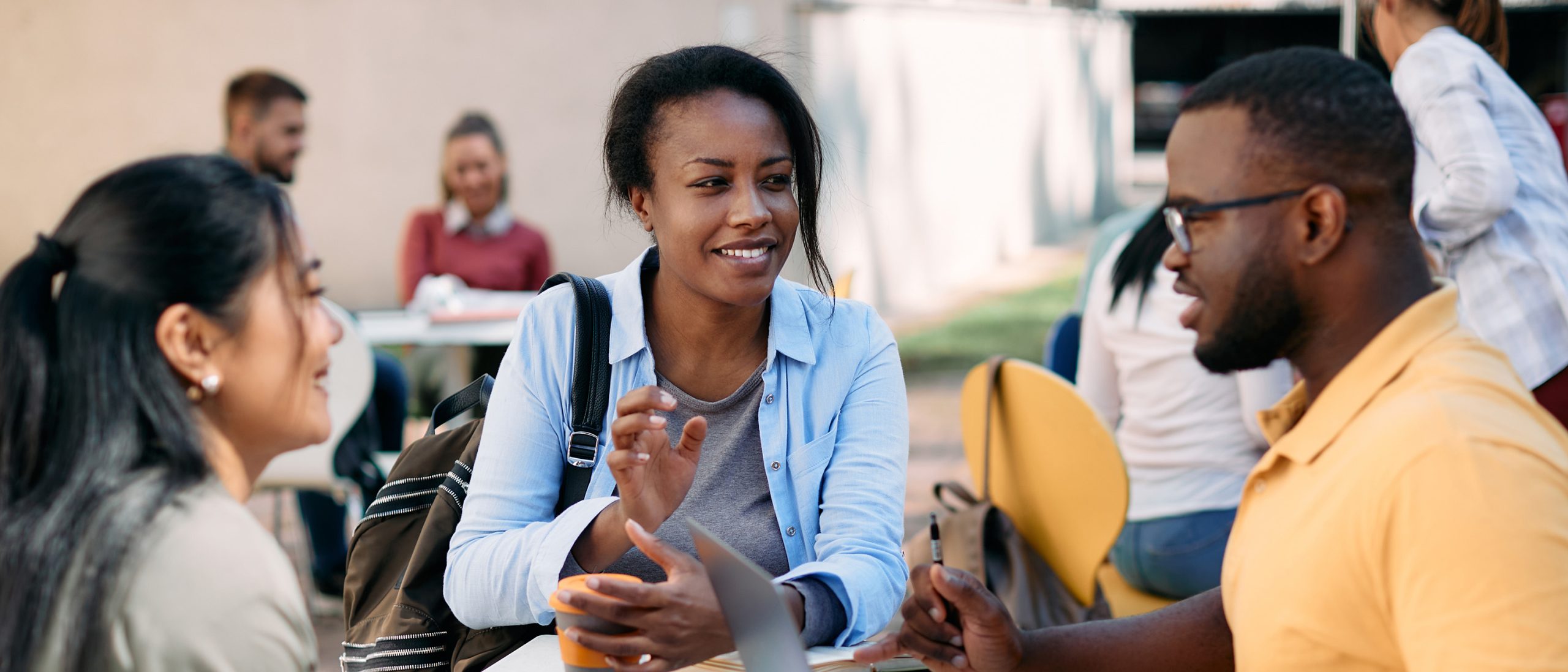 College students at table on campus