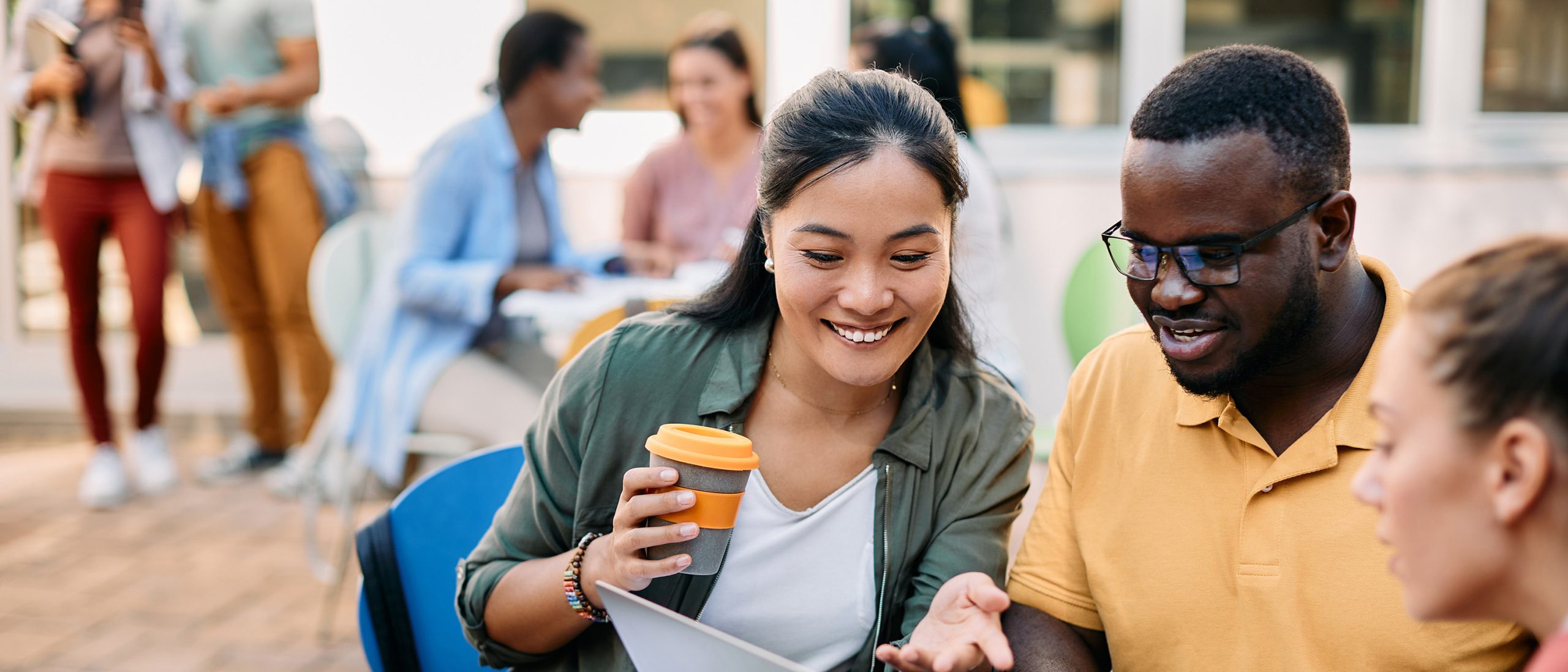 Students studying outside on campus